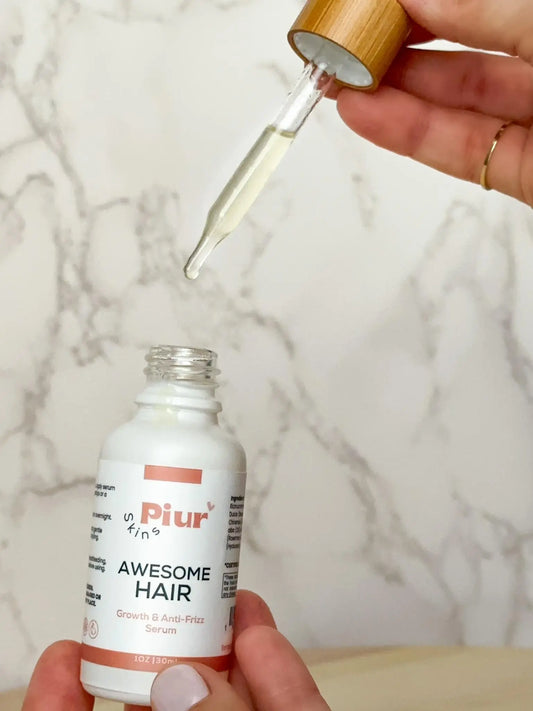 Natural frizz control with Piur Skins' Awesome Hair Growth Serum for smooth, sleek hair.